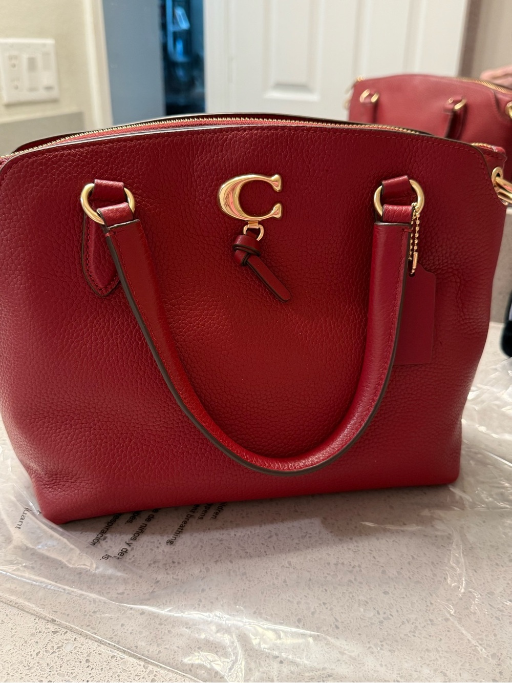 Coach Red Pebbled Leather Satchel with Gold 'C' Logo and Crossbody Belt